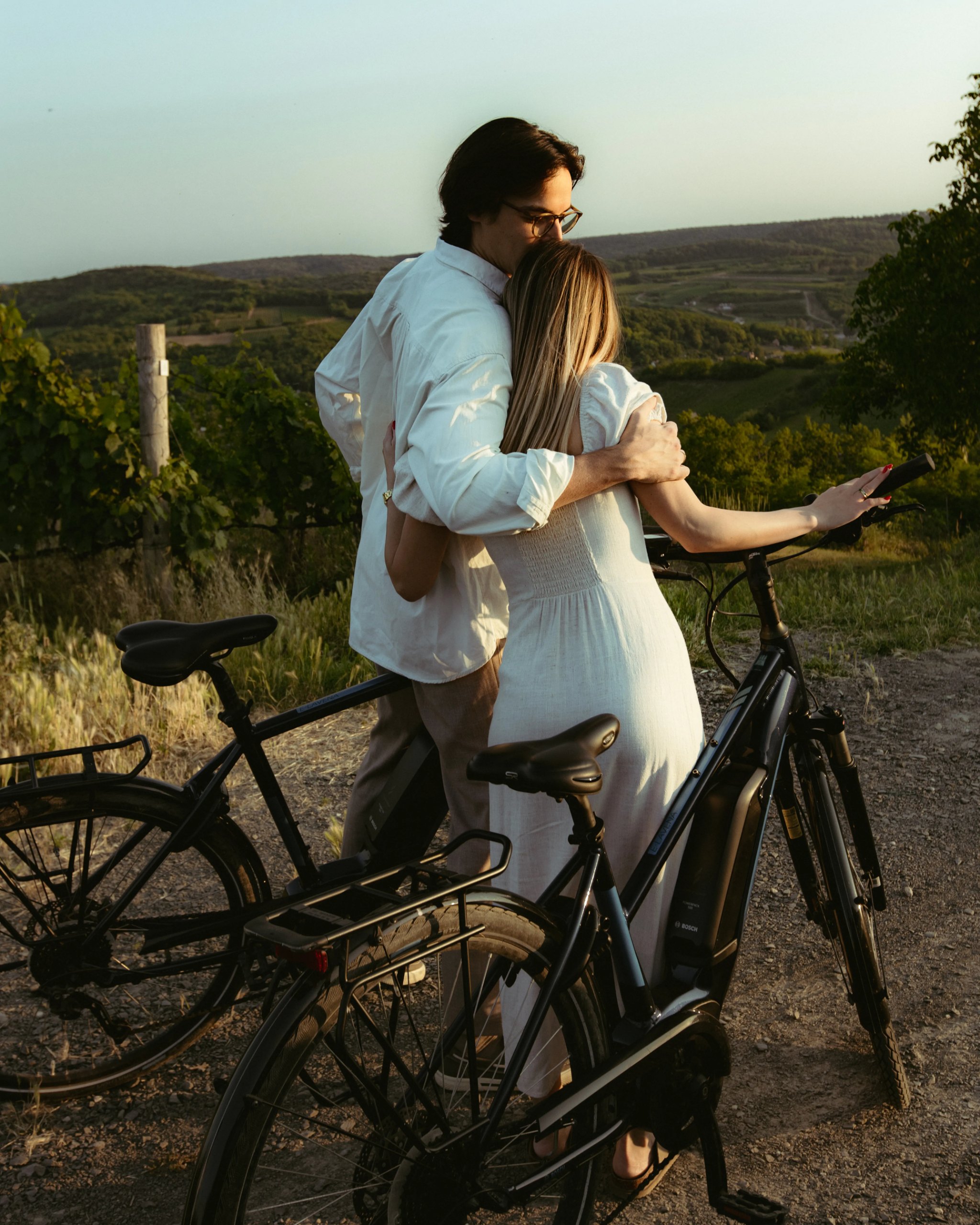 A couple on e-bikes among the Szekszárd vineyards